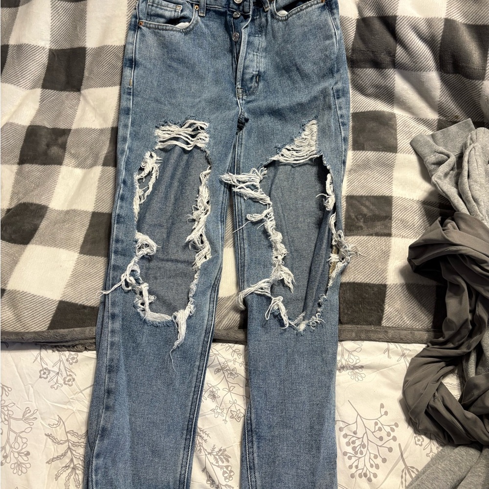 Distressed Blue Denim Jeans